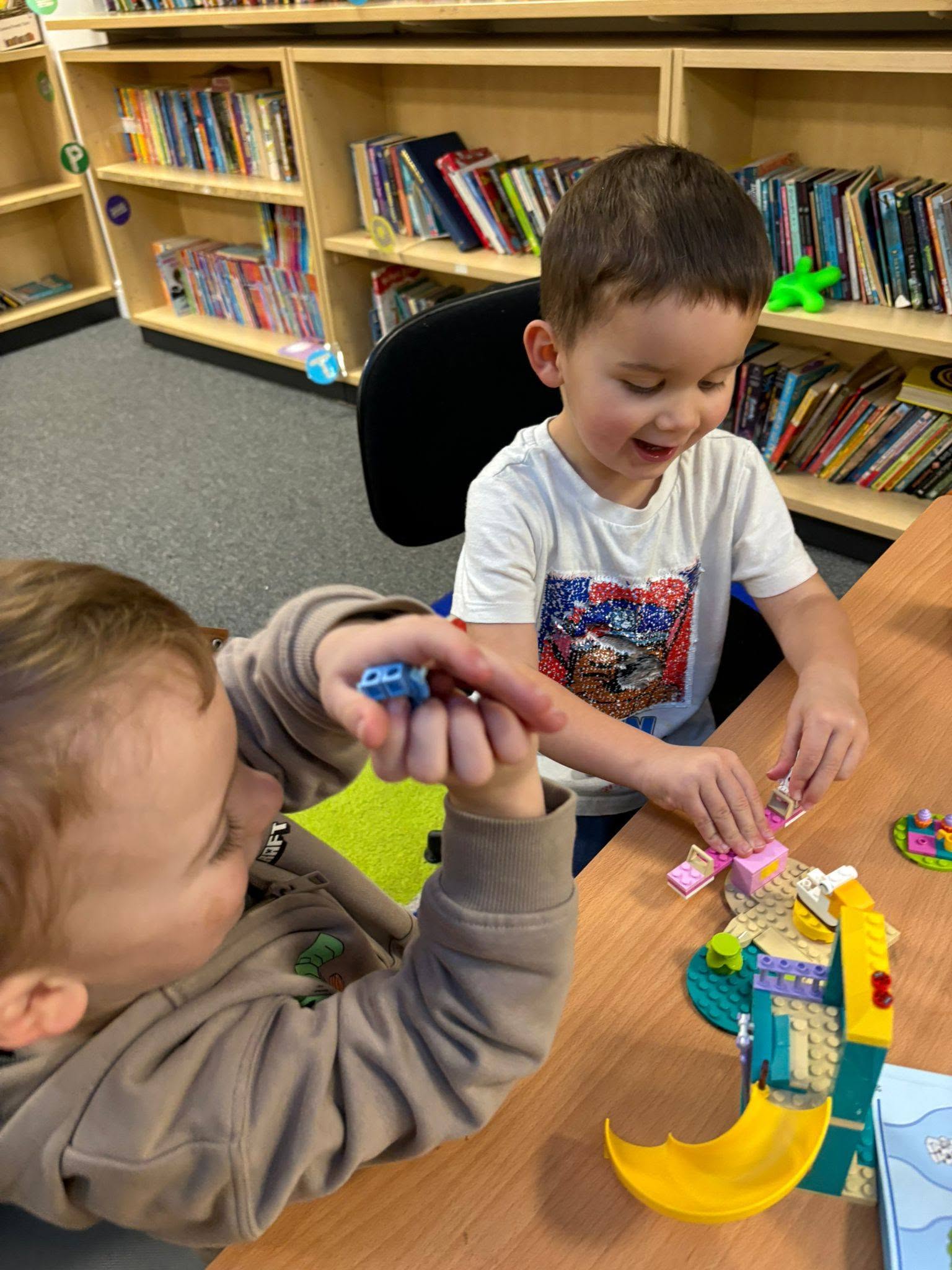 Children building together at LEGO Club